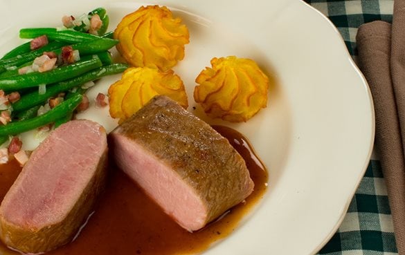 Iglo Wildragout mit Speckfisolen und Pommes Duchesse